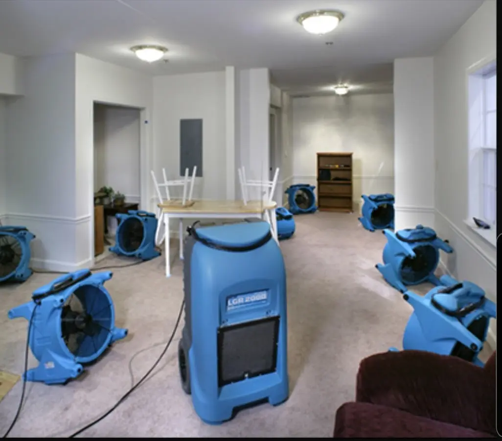 Air movers and dehumidifier setup for Water Damage Restoration in Elizabeth